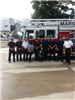 Fire Staff In Front of a Fire Truck