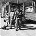 Black and White Photo of Three Firefighters Dressed in Their Uniform