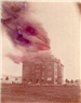 Historical Image of Smoke Engulfing a Large Building