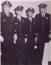 Four Firemen In Uniform