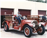 Fireman in a Historical Fire Vehicle