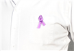 Purple Ribbon Attached to a Shirt