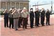 Police Officers in Formation Saluting
